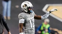 Colorado Buffaloes wide receiver Travis Hunter (12) flips the ball away after making a long catch while being interfered with in the second half of the football game between Colorado and Cincinnati in Boulder, CO.