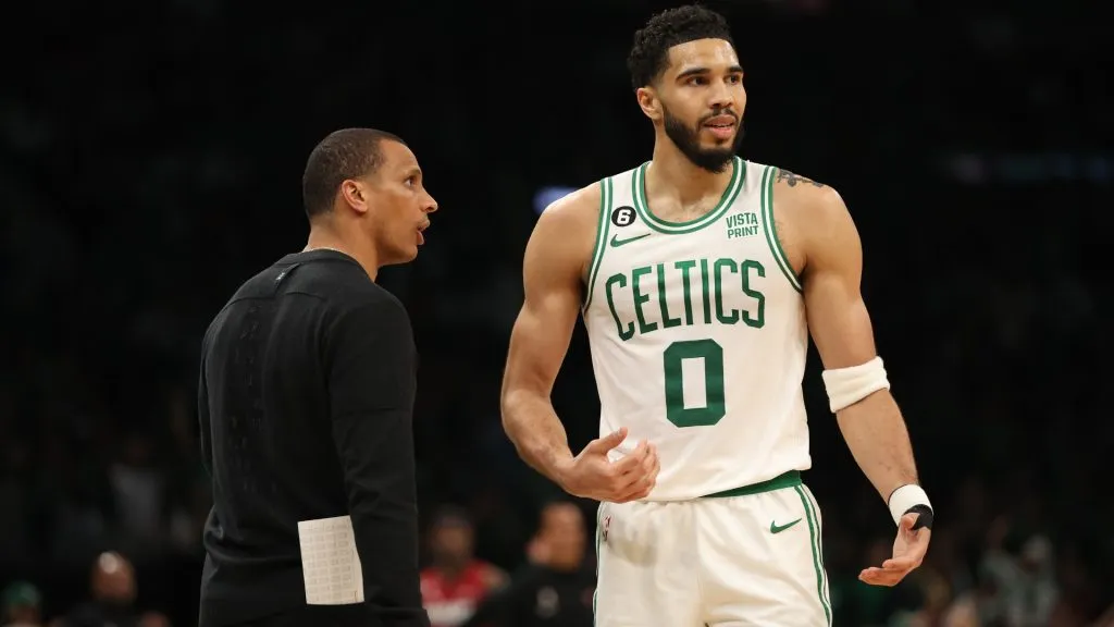 Jayson Tatum #0 of the Boston Celtics speaks with head coach Joe Mazzulla during game one of the Eastern Conference Finals against the Miami Heat at TD Garden on May 17, 2023 in Boston, Massachusetts.