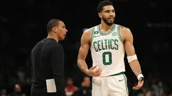 Jayson Tatum #0 of the Boston Celtics speaks with head coach Joe Mazzulla during game one of the Eastern Conference Finals against the Miami Heat at TD Garden on May 17, 2023 in Boston, Massachusetts.
