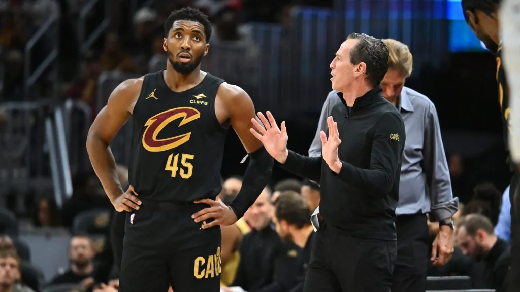 Donovan Mitchell #45 talks to head coach Kenny Atkinson of the Cleveland Cavaliers during the third quarter against the Los Angeles Lakers at Rocket Mortgage Fieldhouse. (Jason Miller/Getty Images)