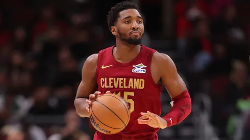 Donovan Mitchell #45 of the Cleveland Cavaliers dribbles up the court against the Chicago Bulls during the first half of a preseason game at the United Center