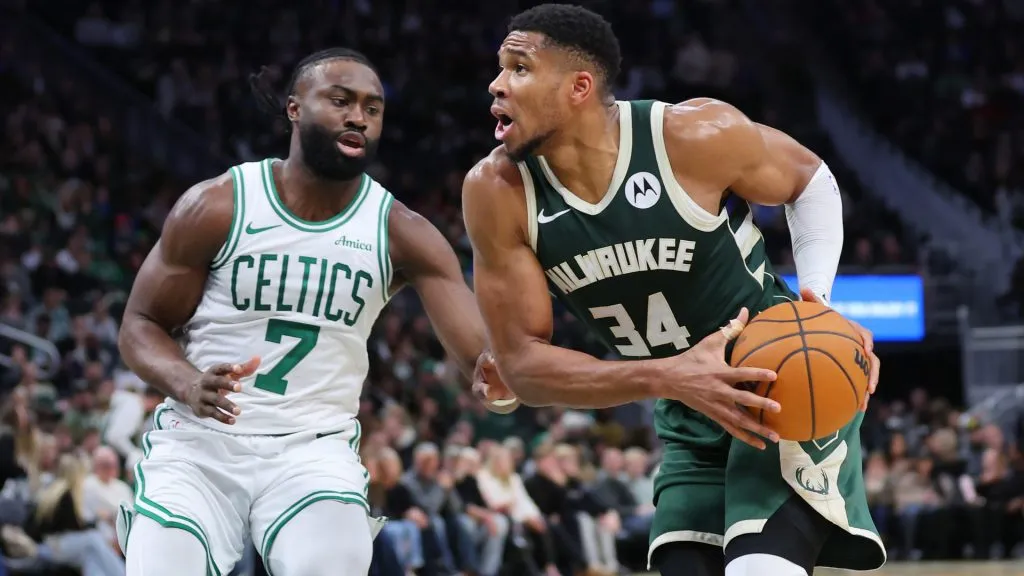 Giannis Antetokounmpo #34 of the Milwaukee Bucks is defended by Jaylen Brown #7 of the Boston Celtics during a game at Fiserv Forum. (Stacy Revere/Getty Images)