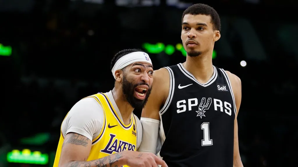 Anthony Davis #3 of the Los Angeles Lakers confers with teammates as he guards Victor Wembanyama #1 of the San Antonio Spurs in the second half at Frost Bank Center. (Ronald Cortes/Getty Images)
