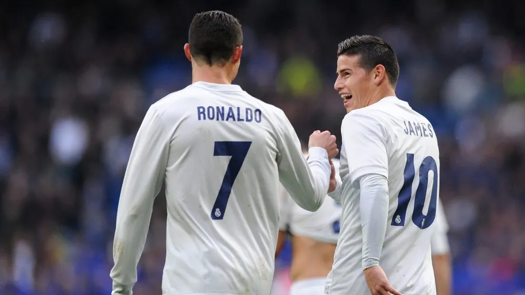 Cristiano Ronaldo of Real Madrid celebrates with James Rodriguez after scoring Real’s 2nd goal from during the La Liga match between Real Madrid CF and Real Sporting de Gijon. Denis Doyle/Getty Images
