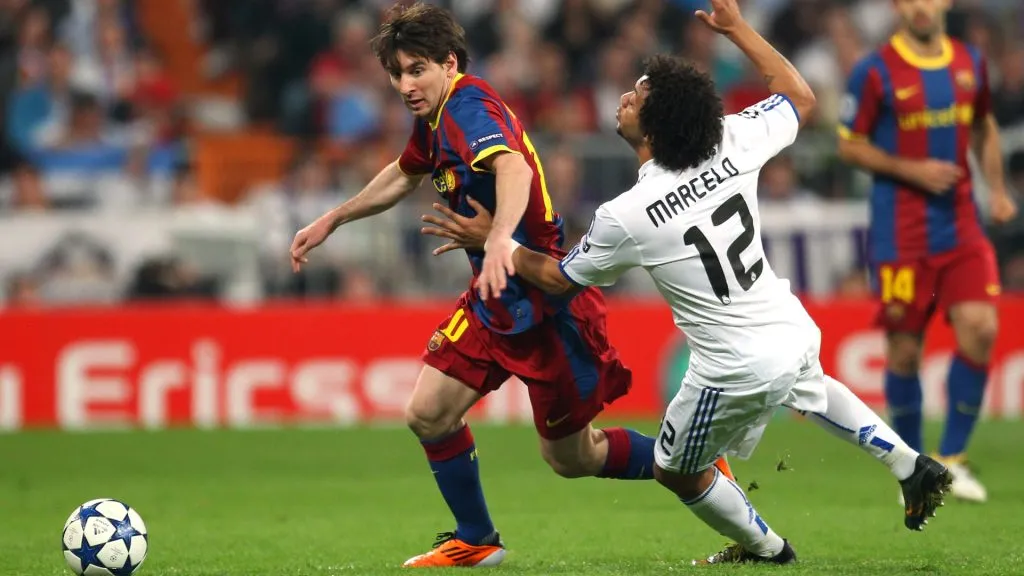 Lionel Messi of Barcelona beats Marcelo of Real Madrid during the UEFA Champions League Semi Final first leg match between Real Madrid and Barcelona at Estadio Santiago Bernabeu. Alex Livesey/Getty Images