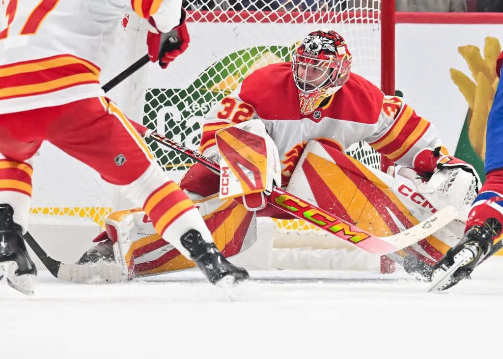 Dustin Wolf #32 of the Calgary Flames tends the net during the first period against the Montreal Canadiens at the Bell Centre on November 5, 2024 in Montreal, Quebec, Canada.  (Photo by Minas Panagiotakis/Getty Images)