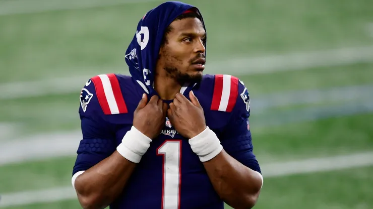 Cam Newton #1 of the New England Patriots looks on from the sidelines during the second half against the Buffalo Bills at Gillette Stadium on December 28, 2020 in Foxborough, Massachusetts.