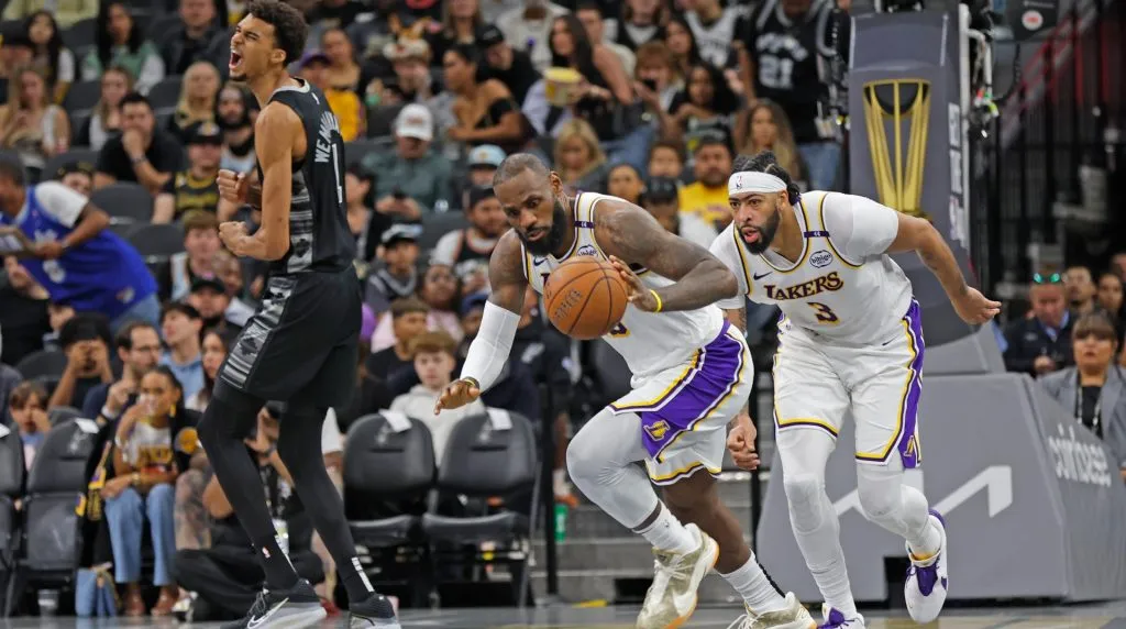LeBron James #23 of the Los Angeles Lakers pushes the ball down court past Victor Wembanyama #1 of the San Antonio Spurs in the second half of the Emirates NBA Cup game at the Frost Bank Center on November 15, 2024 in San Antonio, Texas. (Photo by Ronald Cortes/Getty Images)