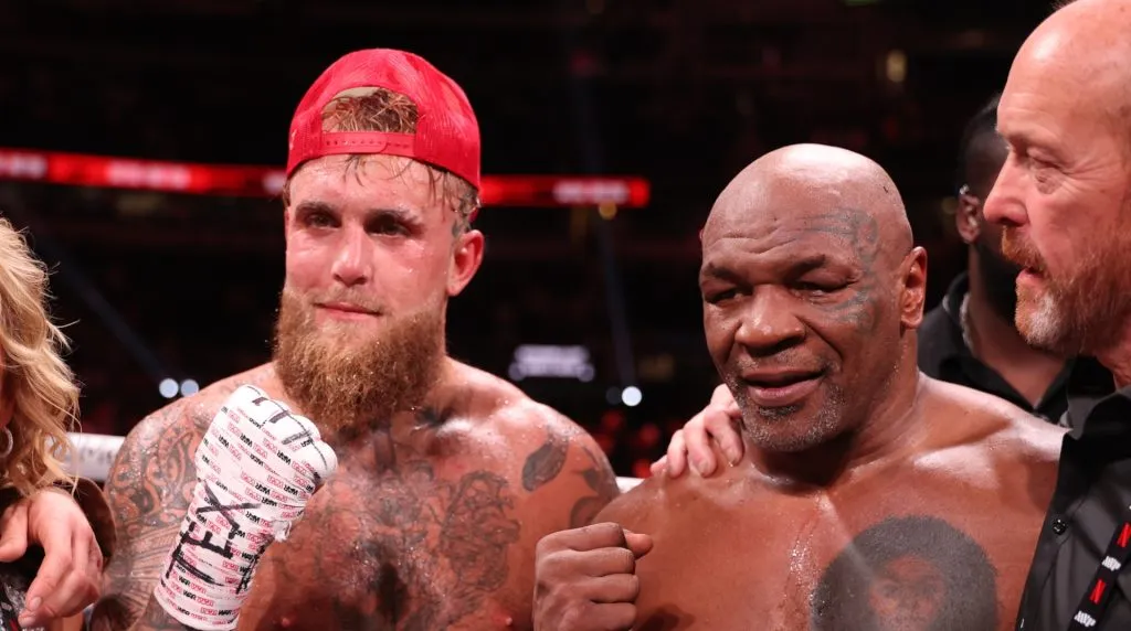 (L-R) Jake Paul announced as winner against Mike Tyson during LIVE On Netflix: Jake Paul vs. Mike Tyson at AT&T Stadium on November 15, 2024 in Arlington, Texas. (Photo by Al Bello/Getty Images for Netflix Ā© 2024)