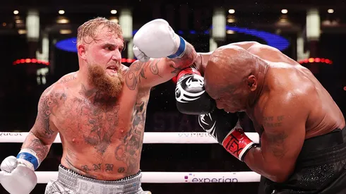 (L-R) Jake Paul and Mike Tyson fight during LIVE On Netflix: Jake Paul vs. Mike Tyson at AT&T Stadium on November 15, 2024 in Arlington, Texas.
