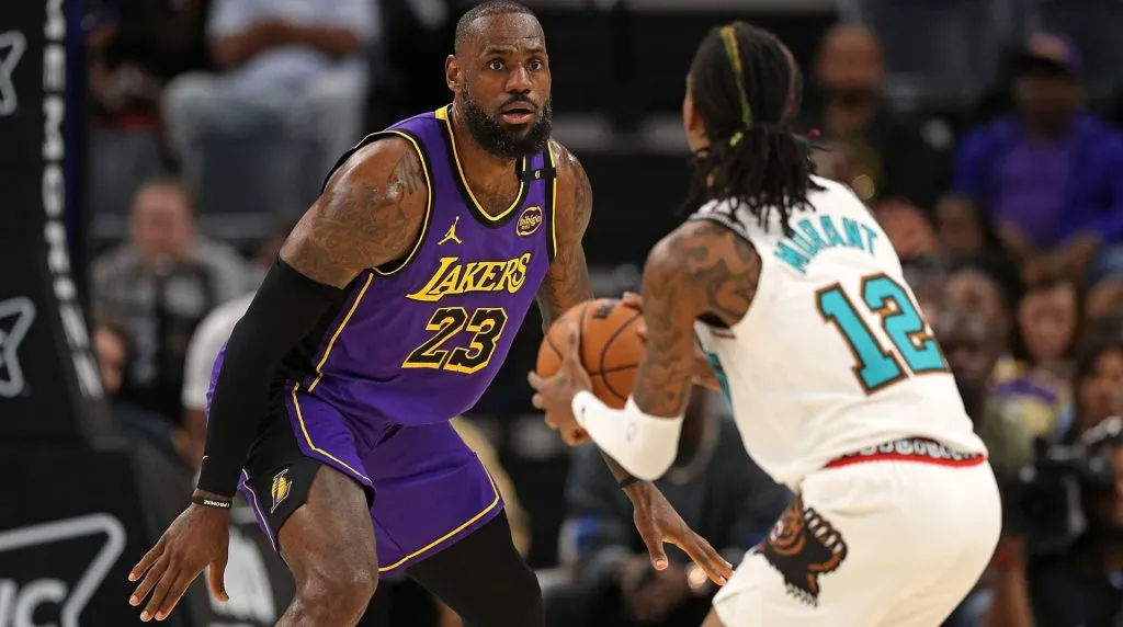 LeBron James #23 of the Los Angeles Lakers defends against Ja Morant #12 of the Memphis Grizzlies in the first half at FedExForum on November 06, 2024 in Memphis, Tennessee. (Photo by Justin Ford/Getty Images)