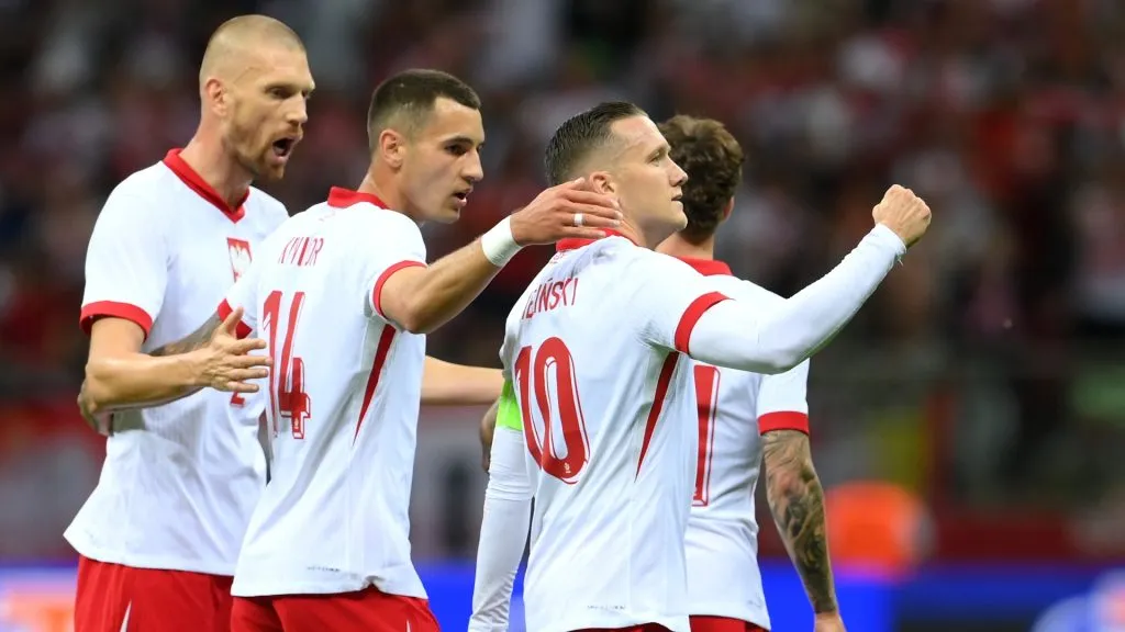Piotr Zielinski of Poland celebrates scoring his team's second goal during the international friendly match between Poland and Ukraine at Stadion Narodowy on June 07, 2024 in Warsaw, Poland.