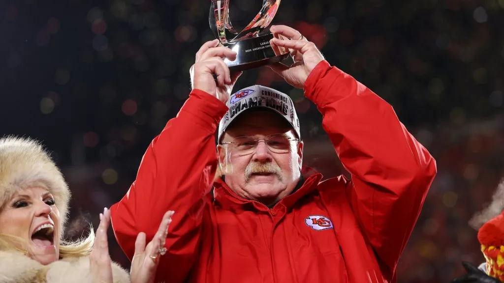Head coach Andy Reid of the Kansas City Chiefs holds up the Lamar Hunt Trophy after defeating the Cincinnati Bengals 23-20 in the AFC Championship Game at GEHA Field at Arrowhead Stadium on January 29, 2023. (Source: Kevin C. Cox/Getty Images)