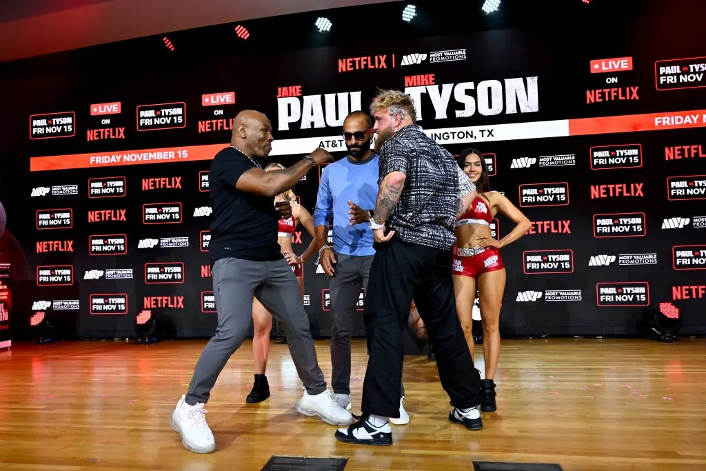 NEW YORK, NEW YORK – AUGUST 18: Mike Tyson and Jake Paul face off at an exclusive press conference ahead of their November bout during the Fanatics Fest NYC 2024 at Jacob Javits Center on August 18, 2024 in New York City.  (Photo by Roy Rochlin/Getty Images for Fanatics)