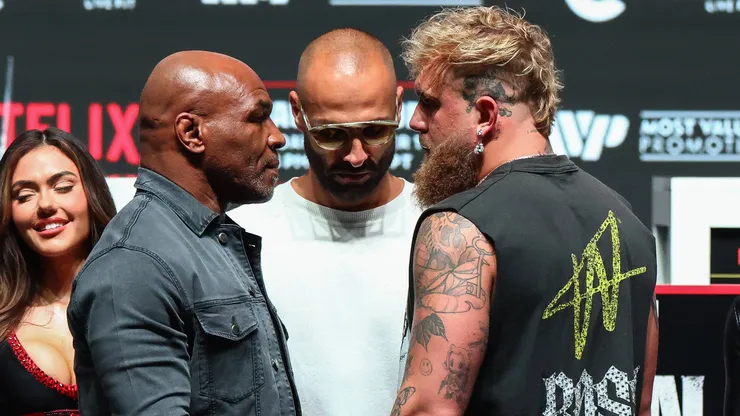 Mike Tyson (left) during the faceoff with Jake Paul (right)
