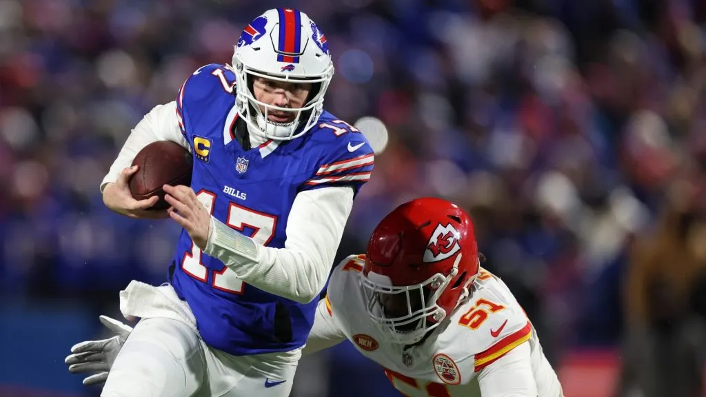 Josh Allen #17 of the Buffalo Bills runs against Mike Danna #51 of the Kansas City Chiefs during their AFC Divisional Playoff game at Highmark Stadium on January 21, 2024 in Orchard Park, New York. (Photo by Al Bello/Getty Images)