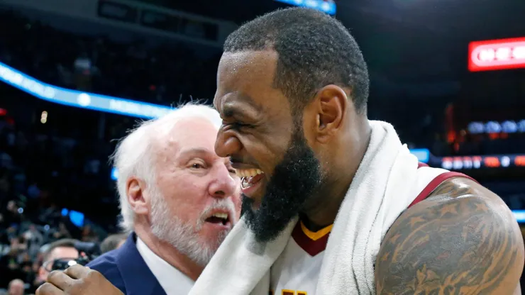 LeBron James #23 of the Cleveland Cavaliers is congratulated by Gregg Popovich head coach of the San Antonio Spurs at the end of the game at AT&T Center on January 23, 2018 in San Antonio, Texas.