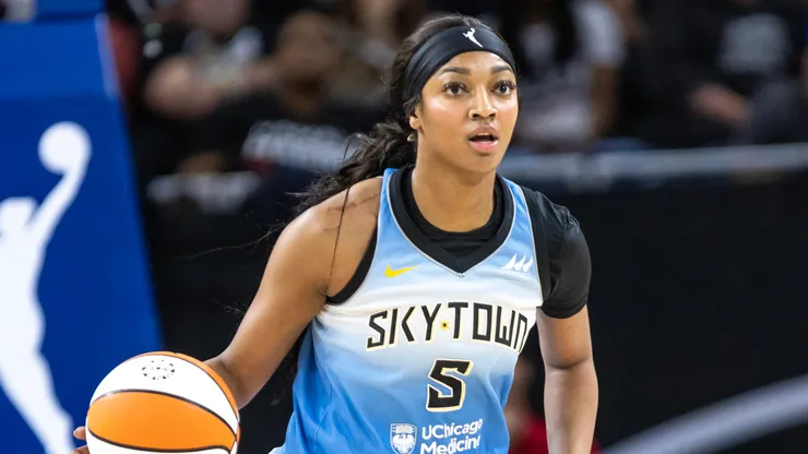 Angel Reese #5 of the Chicago Sky dribbles down the court against the Los Angeles Sparks during the first quarter at Wintrust Arena