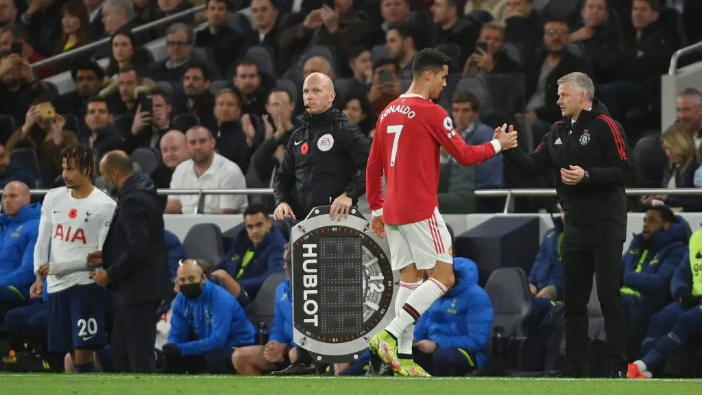 Cristiano Ronaldo of Manchester United embraces Ole Gunnar Solskjaer, Manager of Manchester United as he is substituted during the Premier League match between Tottenham Hotspur and Manchester United at Tottenham Hotspur Stadium on October 30, 2021 in London, England.