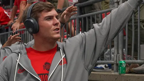 Quarterback Will Howard #18 of the Ohio State Buckeyes greets fans before the game against the Akron Zips at Ohio Stadium on August 31, 2024 in Columbus, Ohio.