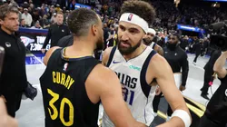 Klay Thompson #31 of the Dallas Mavericks hugs former teammate Stephen Curry #30 of the Golden State Warriors after their game at Chase Center on November 12, 2024 in San Francisco, California. This is Thompson's first game back in Golden State after he was traded to Dallas after last season.
