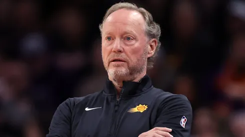 Head coach Mike Budenholzer of the Phoenix Suns and Bradley Beal #3 watch the action during the first half against the Philadelphia 76ers at Footprint Center on November 04, 2024 in Phoenix, Arizona.