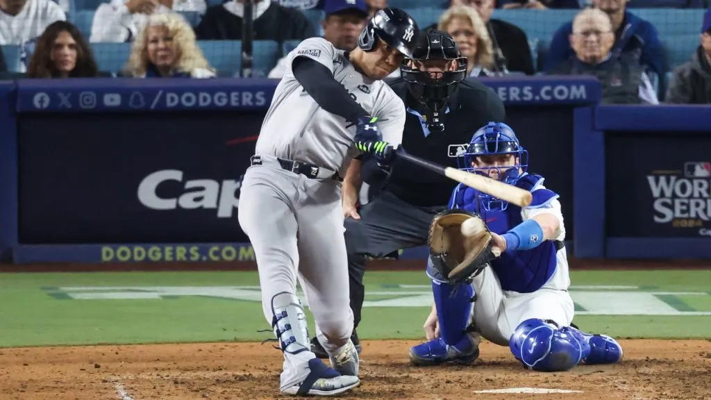 Juan Soto #22 of the New York Yankees hits a single against the Los Angeles Dodgers in the ninth inning during Game Two of the 2024 World Series at Dodger Stadium on October 26, 2024 in Los Angeles, California. (Photo by Steph Chambers/Getty Images)