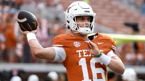 Arch Manning #16 of the Texas Longhorns warms-up prior to a game against the Georgia Bulldogs at Darrell K Royal-Texas Memorial Stadium on October 19, 2024 in Austin, Texas.