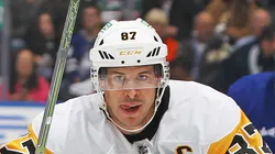 Sydney Crosby #87 of the Pittsburgh Penguins skates against Auston Matthews #34 of the Toronto Maple Leafs during the first period in an NHL game at Scotiabank Arena in Toronto, Ontario, Canada on October 12, 2024. The Maple Leafs defeated the Penguins 4-2.