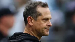 Aaron Boone of the New York Yankees tips his hat before the game against the New York Mets at Citi Field on June 26, 2024 in the Queens borough of New York City.