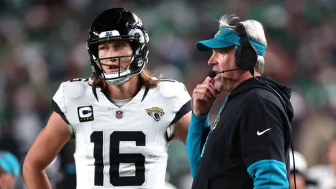 Trevor Lawrence #16 and head coach Doug Pederson of the Jacksonville Jaguars talk in the third quarter of a game against the Philadelphia Eagles at Lincoln Financial Field on November 03, 2024 in Philadelphia, Pennsylvania.