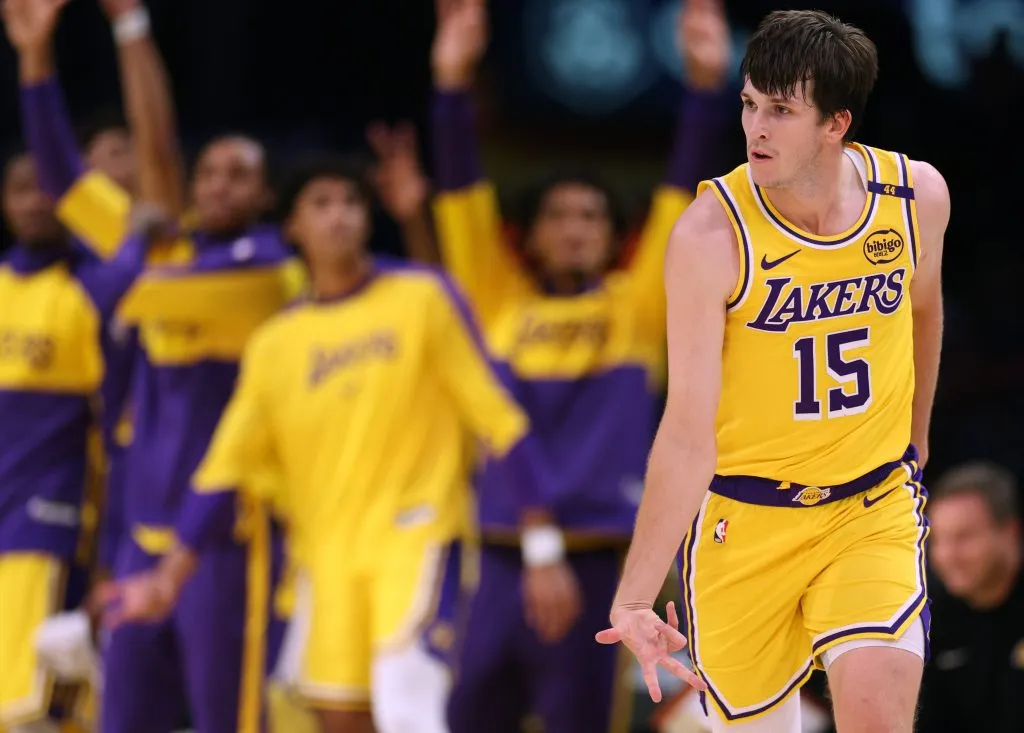 Austin Reaves #15 of the Los Angeles Lakers reacts to his three pointer during the first half against the Philadelphia 76ers at Crypto.com Arena. Harry How/Getty Images
