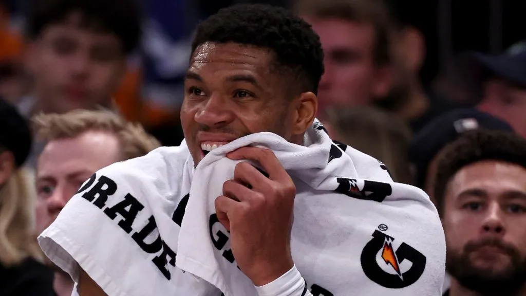 Giannis Antetokounmpo #34 of the Milwaukee Bucks reacts on the bench in the second half against the New York Knicks. Elsa/Getty Images