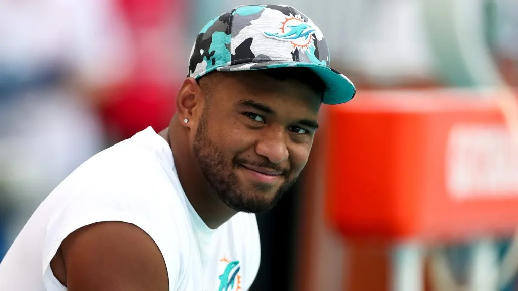 Tua Tagovailoa #1 of the Miami Dolphins looks on from the bench prior to playing the Philadelphia Eagles at Hard Rock Stadium on August 27, 2022. (Source: Megan Briggs/Getty Images)
