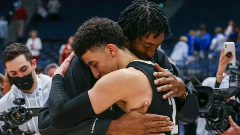 Scotty Pippen Jr. hugs his father, Chicago Bulls legend Scottie Pippen