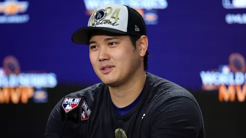Shohei Ohtani #17 of the Los Angeles Dodgers talks to the media after the Dodgers defeated the New York Yankees 7-6 in game 5 to win the 2024 World Series at Yankee Stadium on October 30, 2024 in the Bronx borough of New York City.