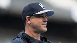 Manager Aaron Boone #17 of the New York Yankees plays catch before a game against the Chicago White Sox at Guaranteed Rate Field on August 12, 2024 in Chicago, Illinois.