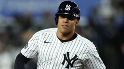 Juan Soto #22 of the New York Yankees rounds the bases after hitting a home run during the 3rd inning of Game One of the American League Championship Series against the Cleveland Guardians at Yankee Stadium on October 14, 2024 in New York City.