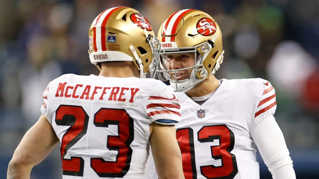 Christian McCaffrey with Brock Purdy, players of the San Francisco 49ers