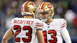 Christian McCaffrey with Brock Purdy, players of the San Francisco 49ers