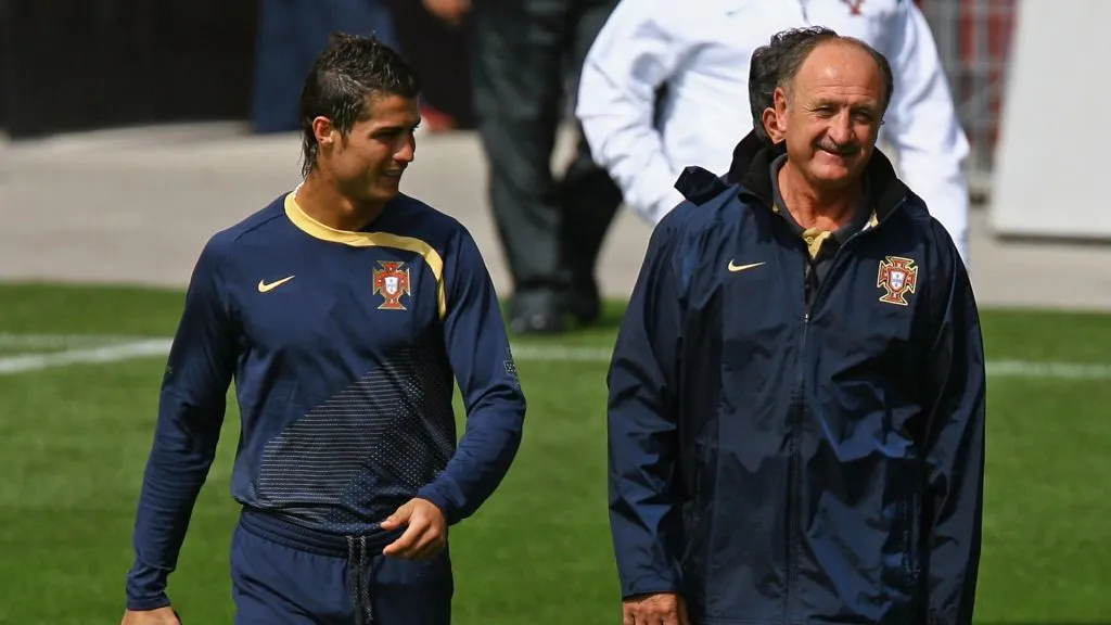 Cristiano Ronaldo (L) talks with head coach Luiz Felipe Scolari during the Portugal training session at Stade La Maladiere on June 14, 2008 in Neuchatel, Switzerland.