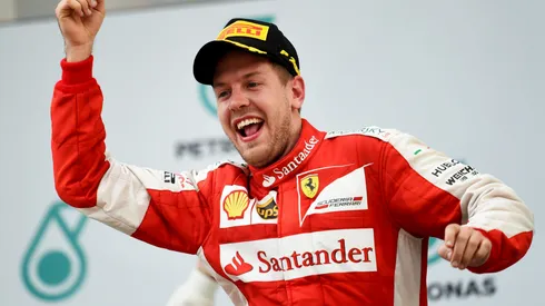 Sebastian Vettel of Germany celebrates after winning the Malaysia Formula One Grand Prix in 2015
