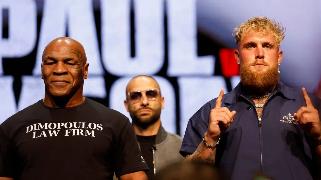 (L-R) Mike Tyson and Jake Paul speak onstage at the press conference in promotion for the upcoming Jake Paul vs. Mike Tyson boxing match at The Apollo Theater on May 13, 2024 in New York City. (Photo by Sarah Stier/Getty Images for Netflix)