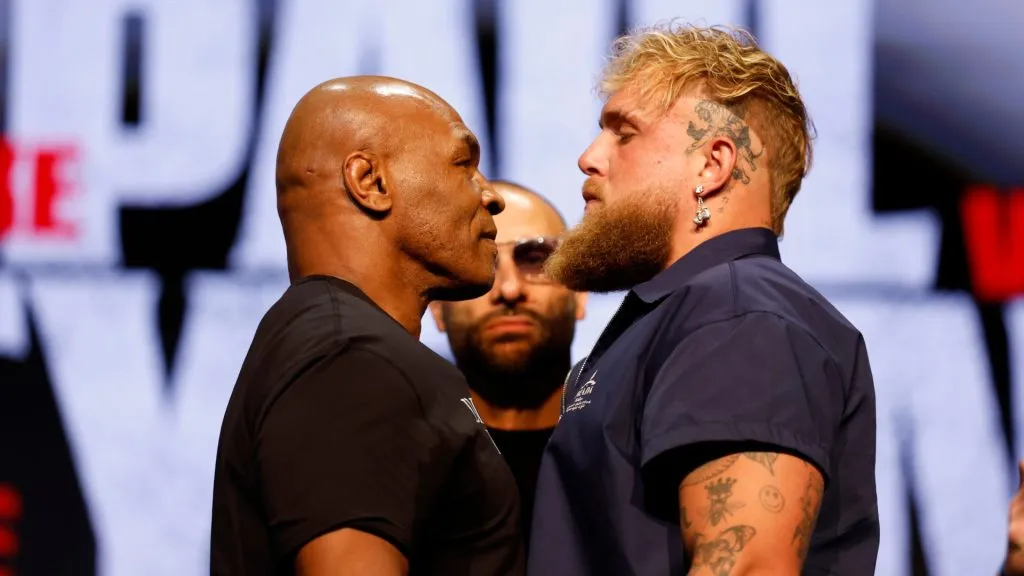 (L-R) Mike Tyson and Jake Paul speak onstage at the press conference in promotion for the upcoming Jake Paul vs. Mike Tyson boxing match at The Apollo Theater on May 13, 2024 in New York City. (Photo by Sarah Stier/Getty Images for Netflix)