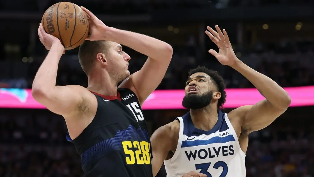 Nikola Jokic #15 pf the Denver Nuggets is guarded by Karl-Anthony Towns #32 of the Minnesota Timberwolves in the first quarter during Game Two of the Western Conference Second Round Playoffs at Ball Arena on May 06, 2024 in Denver, Colorado. 