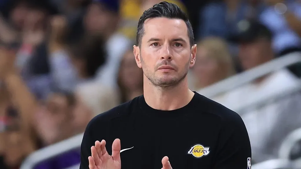 Los Angeles Lakers Head Coach JJ Redick looks on from the bench during the first half of a game against the Minnesota Timberwolves at Acrisure Arena on October 04, 2024. (Source: Sean M. Haffey/Getty Images)