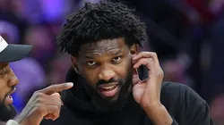 Paul George #8 of the Philadelphia 76ers talks to Joel Embiid #21 during a timeout in the game against the Memphis Grizzlies in the first half at the Wells Fargo Center on November 2, 2024 in Philadelphia, Pennsylvania.