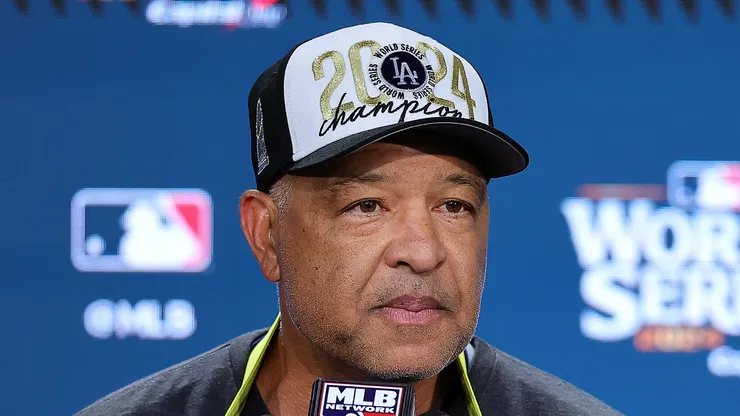 Manager Dave Roberts #30 of the Los Angeles Dodgers talks to the media after the Dodgers defeated the New York Yankees 7-6 in game 5 to win the 2024 World Series at Yankee Stadium on October 30, 2024 in the Bronx borough of New York City.