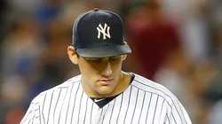 Archive: Nathan Eovaldi #30 of the New York Yankees reacts after the eighth inning against the Houston Astros at Yankee Stadium on August 24, 2015 in the Bronx borough of New York City.