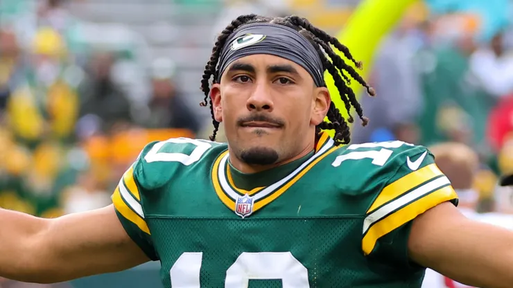 Jordan Love #10 of the Green Bay Packers runs off the field after defeating the Arizona Cardinals 34-13 at Lambeau Field on October 13, 2024 in Green Bay, Wisconsin.